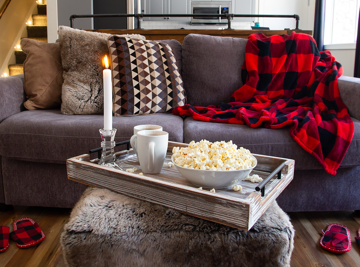 Couch with blanket and popcorn