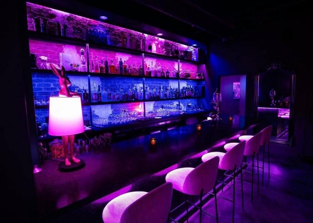 Very cool bar with purple lighting